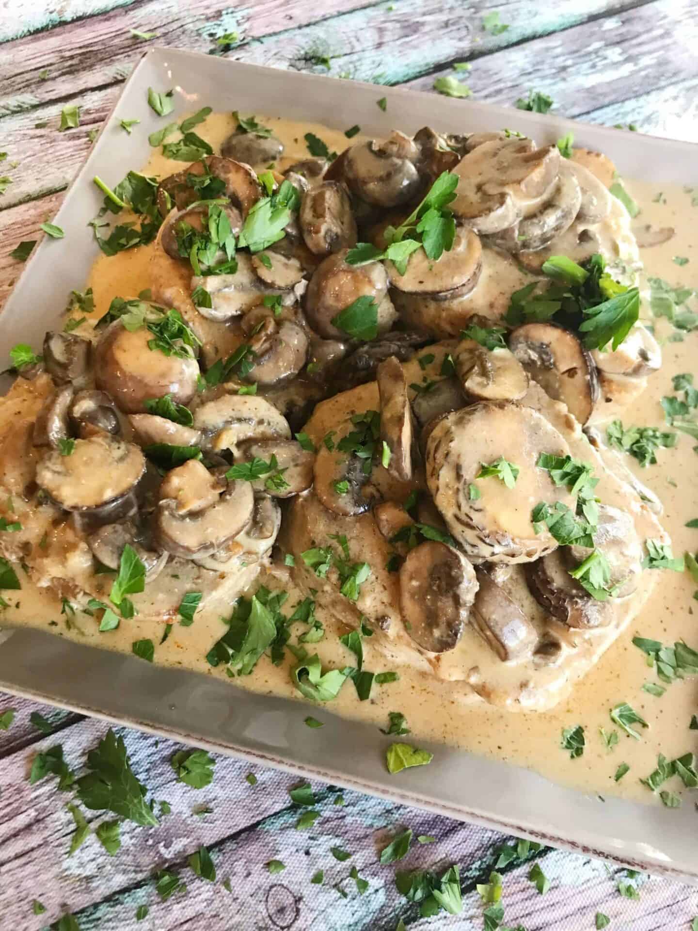 Garlic and Mushroom Pork Chops in Creamy White Wine Sauce
