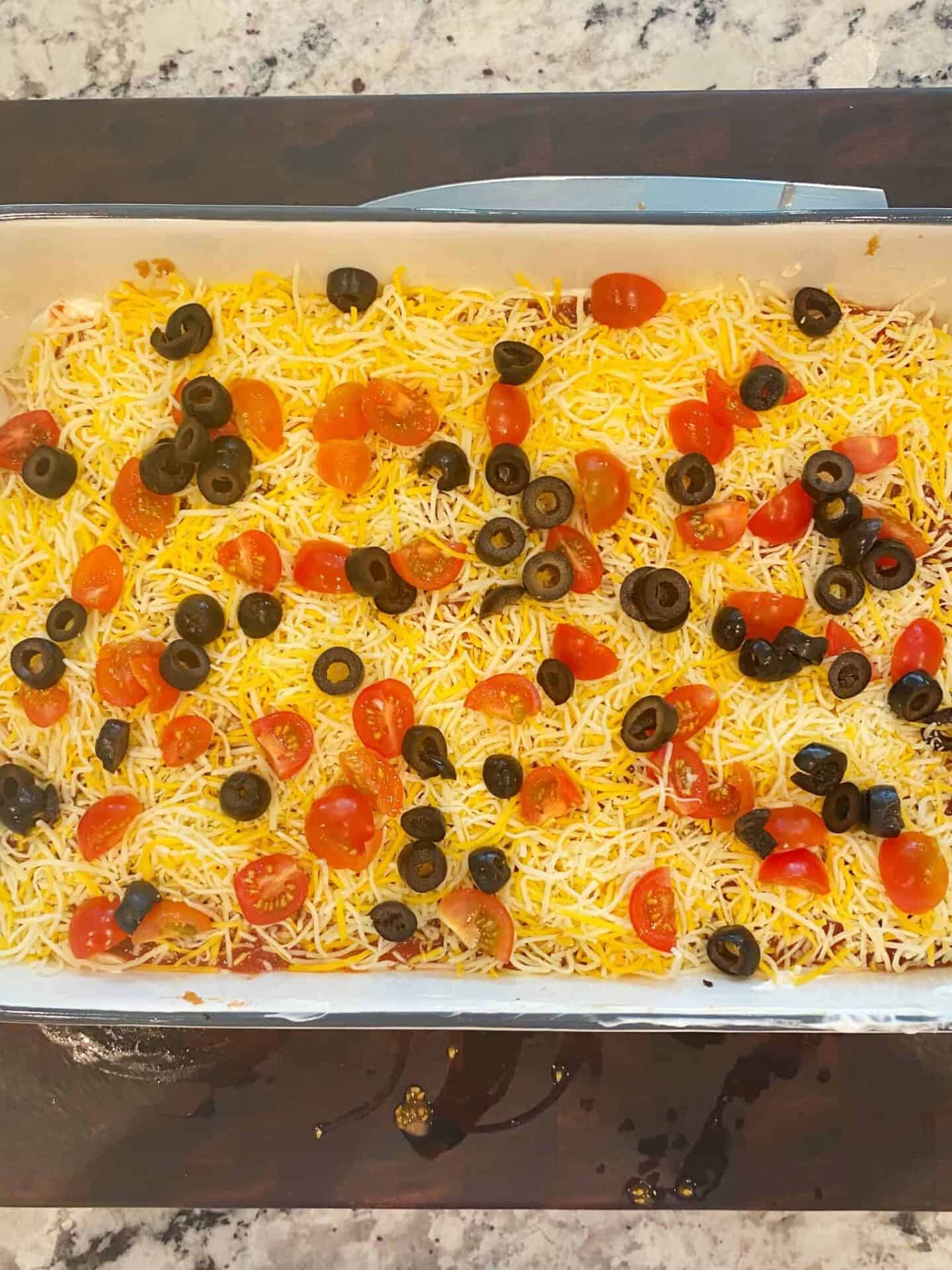 Seven-Layer-Dip-tomatoes-olives-green-onion