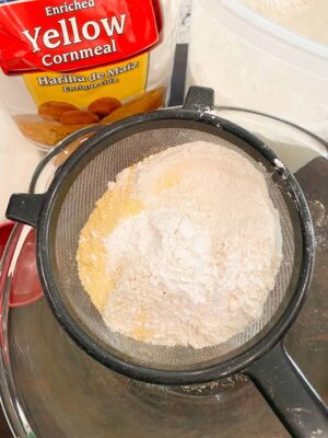 sift-together-cornmeal-flour-salt-and-baking-powder