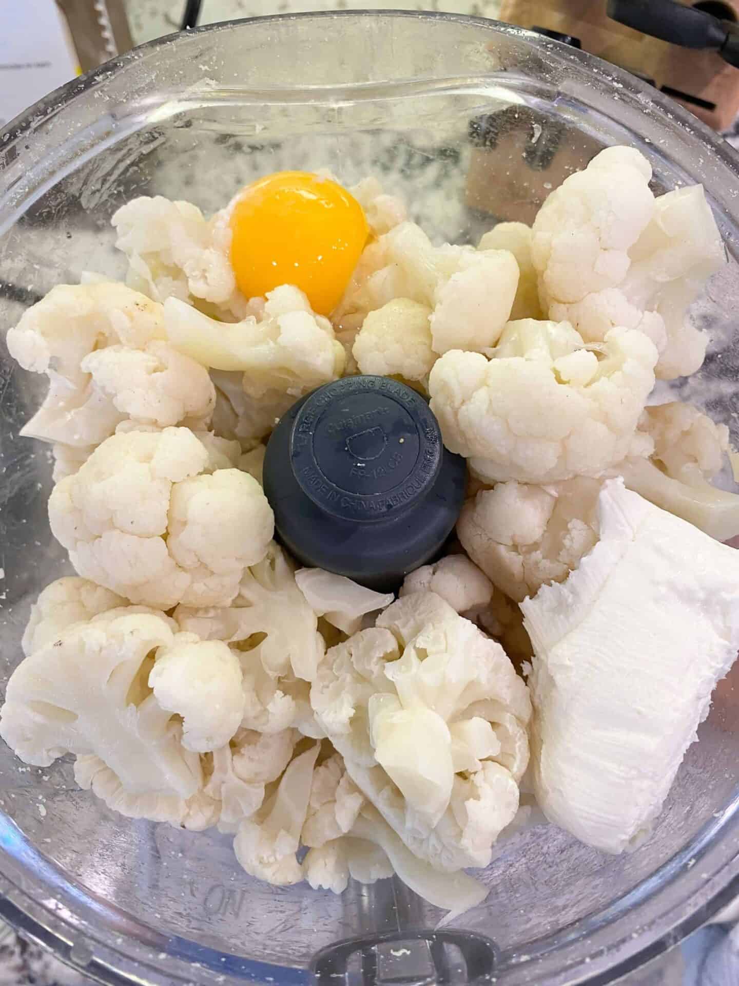 mix-steamed-cauliflower-with-egg-yolk-and-cream-cheese