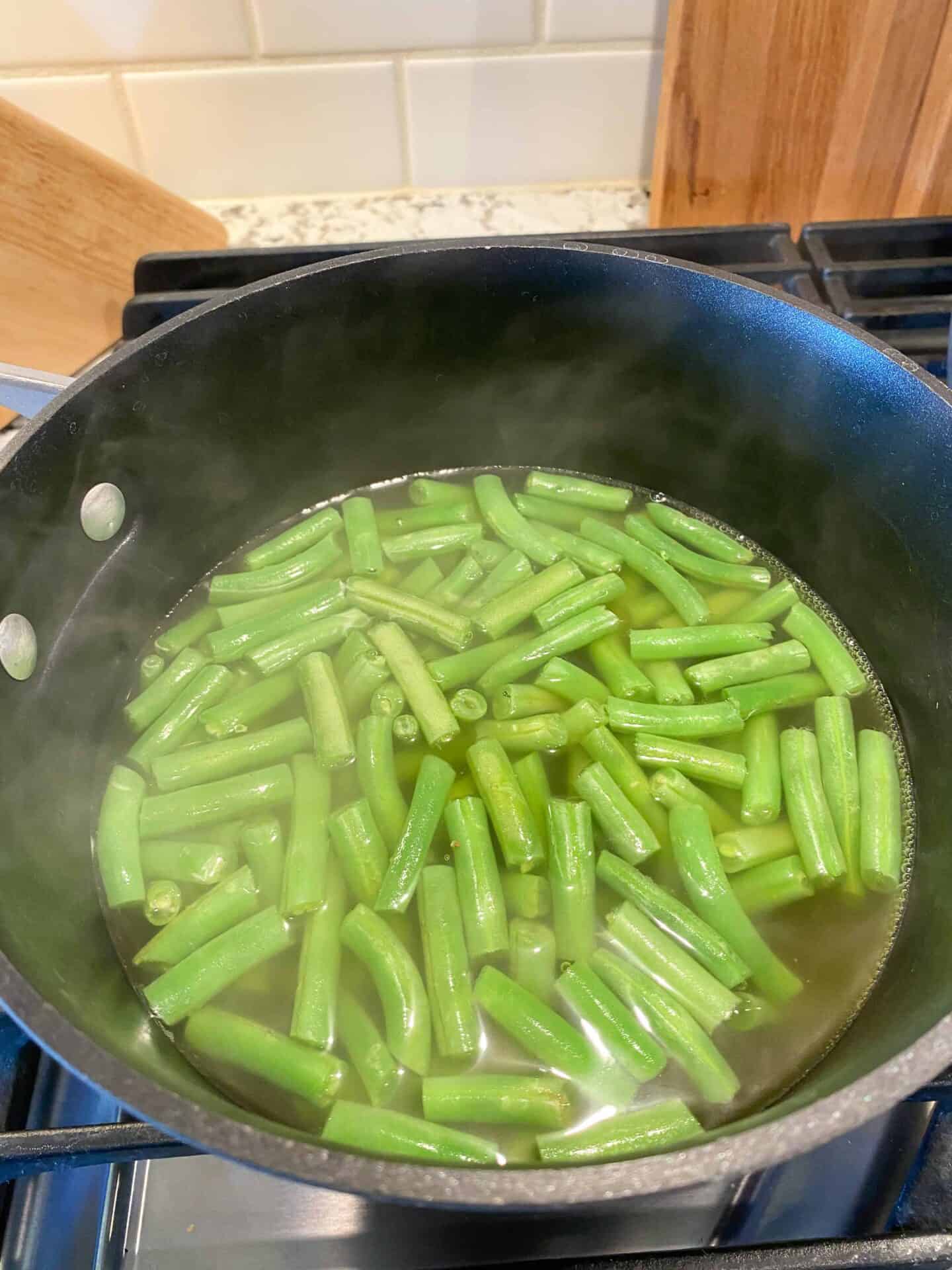 cook green beans in chicken stock