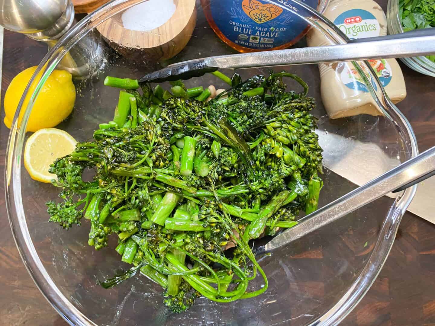 toss asparagus and broccolini with dressing