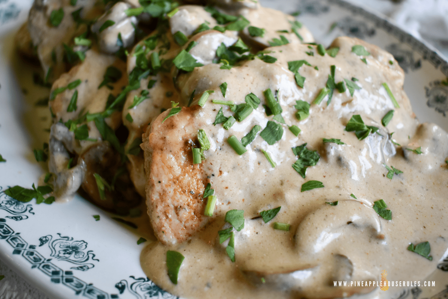 These Garlic and Mushroom Pork Chops in Creamy White Wine Sauce are an easy recipe that's quick and full of flavor! It's perfect for a busy weeknight! Pork Chops | Pork Chops Recipes | Pork Chops and Gravy | Easy Dinner Recipes | Easy Dinner Recipes Healthy | Easy Meals | Easy Healthy Dinner | Easy Dinner | Pork Chop Recipes | Pork Recipes | Creamy Pork Chops | Creamy Pork Chop Recipes | Low Carb Recipes | Mushroom Recipes