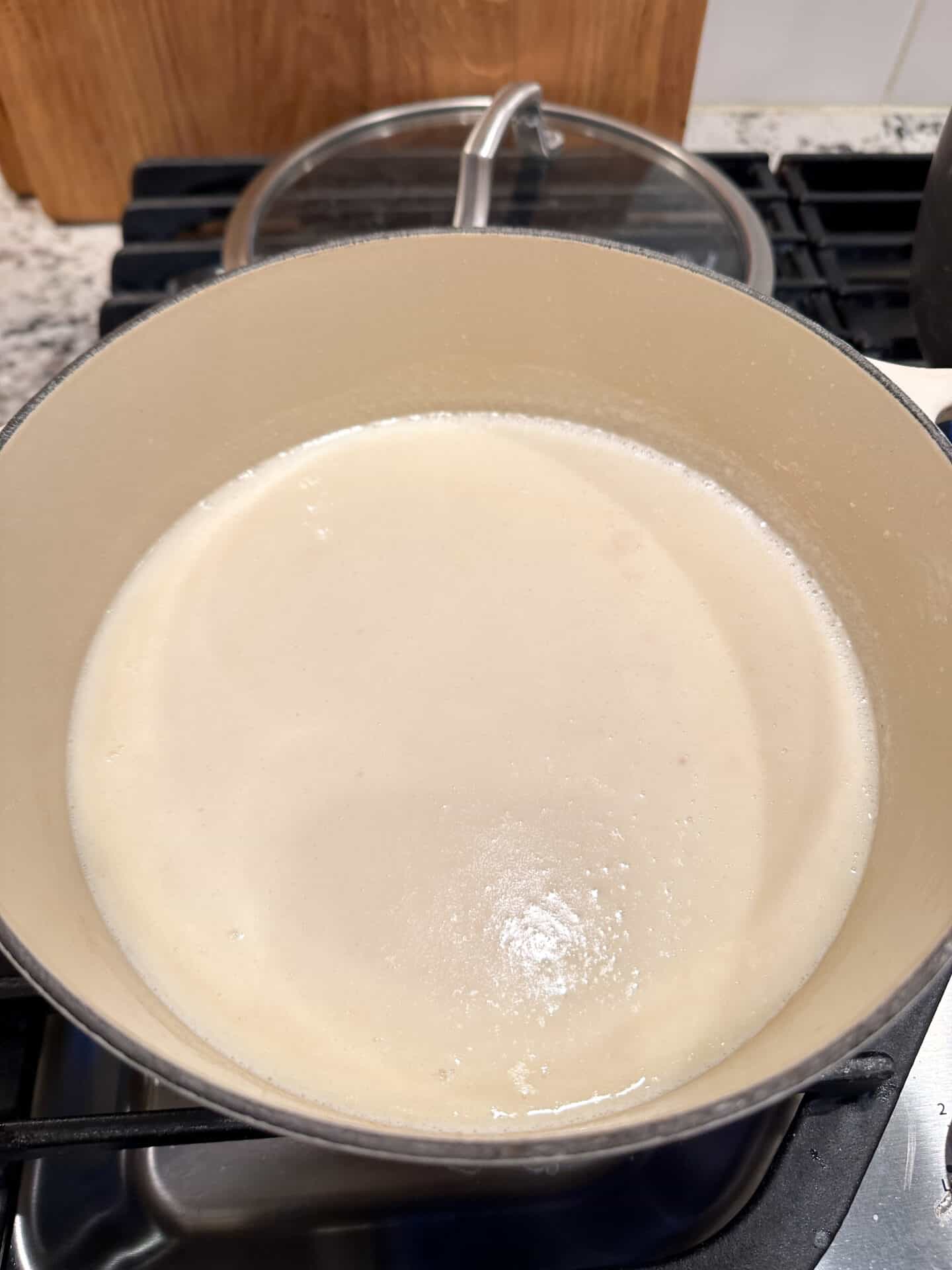 simmer bechamel until it forms a cream